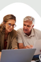 Parents reviewing coverage details on a laptop at home